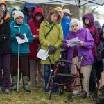 Mary Lou Spartz reads the names of victims buried at the Evergreen Cemetery during a memorial service on Thursday, Oct. 25, 2018, on the 100th anniversary of the sinking of the Princess Sophia. The service takes place at the gravesite of Walter Harper and his wife, Frances Wells. (Michael Penn | Juneau Empire)