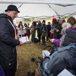 The Reverend Gordon Blue, of The Church of the Holy Trinity, leads a memorial service at the Evergreen Cemetery on Thursday, Oct. 25, 2018, on the 100th anniversary of the sinking of the Princess Sophia. The service takes place at the gravesite of Walter Harper and his wife, Frances Wells. (Michael Penn | Juneau Empire)