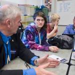 Senate District Q candidate Don Etheridge, left, and House District 34 candidate Jerry Nankervis, right, talk with Thunder Mountain High School senior students Arianna Csech, center, and Eric Sidney during their government class on Friday, Oct. 26, 2018. (Michael Penn | Juneau Empire)