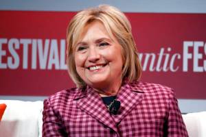 In this Oct. 2, 2018, file photo, former Secretary of State Hillary Clinton talks with Jeffrey Goldberg, editor in chief of The Atlantic, during The Atlantic Festival, in Washington. On Monday via Twitter, Clinton endorsed 17 Democratic governor candidates, including Alaskas Mark Begich (Alex Brandon | The Associated Press)