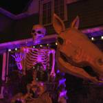 The Wraith and his horse stand watch at the Jones home at the corner of 10th Street and Glacier Avenue on Monday, Oct. 29, 2018. The house becomes the Witchs Haunted House for a few hours every Halloween, welcoming around 400 people into the basement for a scare or several. (Alex McCarthy | Juneau Empire)