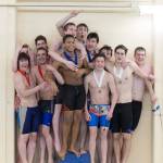 The JDHS boys swim team celebrate their Region V Championship on Saturday at the Petersburg Community Center. (Courtesy Photo | Phil Loseby)