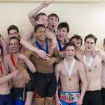 The JDHS boys swim team celebrate their Region V Championship on Saturday at the Petersburg Community Center. (Courtesy Photo | Phil Loseby)