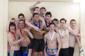 The JDHS boys swim team celebrate their Region V Championship on Saturday at the Petersburg Community Center. (Courtesy Photo | Phil Loseby)