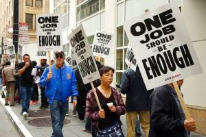Hotel workers strike for a wage increase in front of a Marriott hotel Thursday, Oct. 4, 2018, in San Francisco. Alaskas minimum wage is set to rise to $9.89 per hour on Jan. 1. (Ben Margot | The Associated Press)