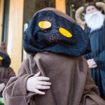 Aurelia Peoples, 4, center, and Mia Belvins, 3, are costumed as Jawas as they visit DJ Thomson at Devils Club Brewery on Wednesday, Oct. 31, 2018. For the fourth year Kindred Post has organized the Halloween celebration for trick-or-treaters. (Michael Penn | Juneau Empire)