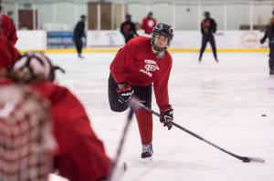 Senior Greyson Liebelt shoots to the goal during Juneau-Douglas High School hockey practice at Treadwell Arena on Thursday, Nov. 1, 2018. (Michael Penn | Juneau Empire)