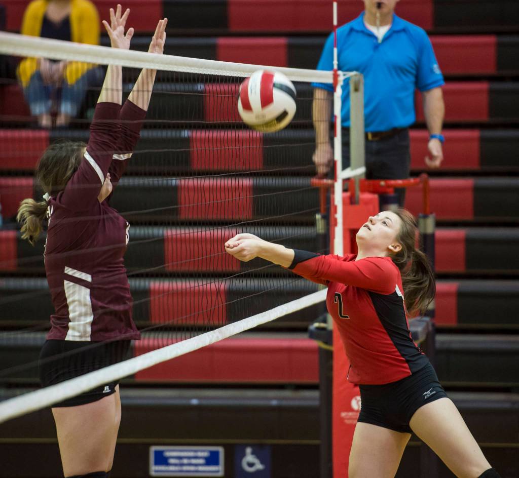 Juneau-Douglas Kiana Potter bumps the ball up againt Ketchikan in the first round of the Region V Volleyball Championships at JDHS on Friday, Nov. 2, 2018. JDHS won 3-0 (25-13, 25-16, 25-16). (Michael Penn | Juneau Empire)
