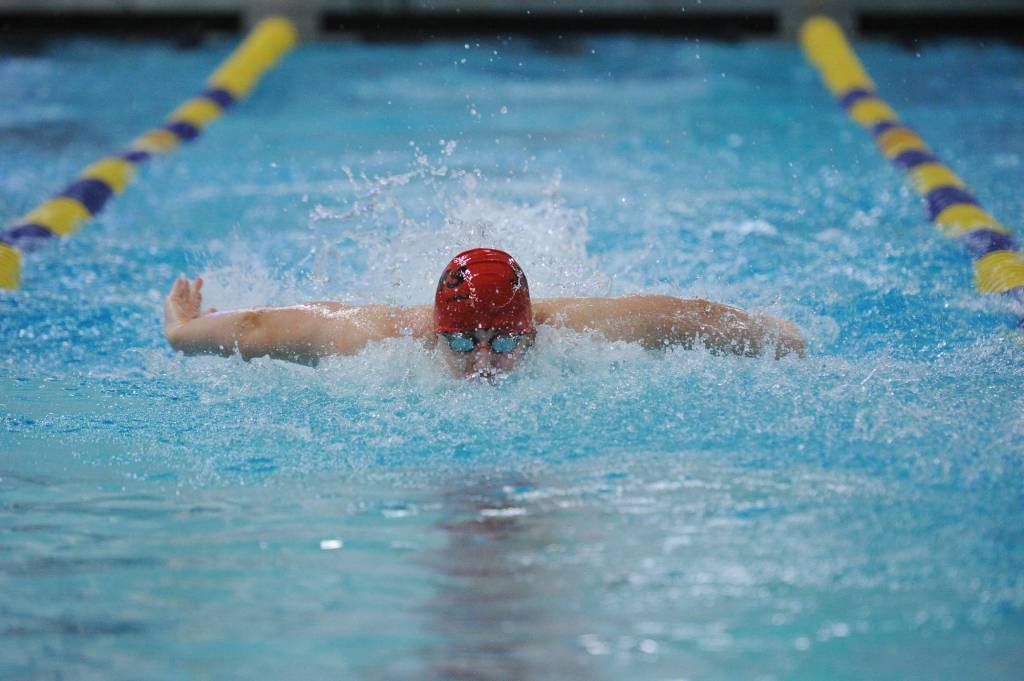 Juneau-Douglas High School senior Tate Goering swims the butterfly portion of the boys 200-yard medley relay on Saturday at the ASAA/First National Bank Alaska Swim & Dive Championships at Bartlett Pool in Anchorage. Goering and teammates Caleb Peimann, Tyler Weldon and Reed Gardinier finished in seventh place. (Michael Dinneen | For the Juneau Empire) Pool in Anchorage. (Michael Dinneen | For the Juneau Empire)