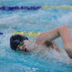 Thunder Mountain High School junior Micah Grigg swms in the 200-yard freestyle final on Saturday at the ASAA/First National Bank Alaska Swim & Dive Championships at Bartlett Pool in Anchorage. Grigg finished in fifth place. (Michael Dinneen | For the Juneau Empire)