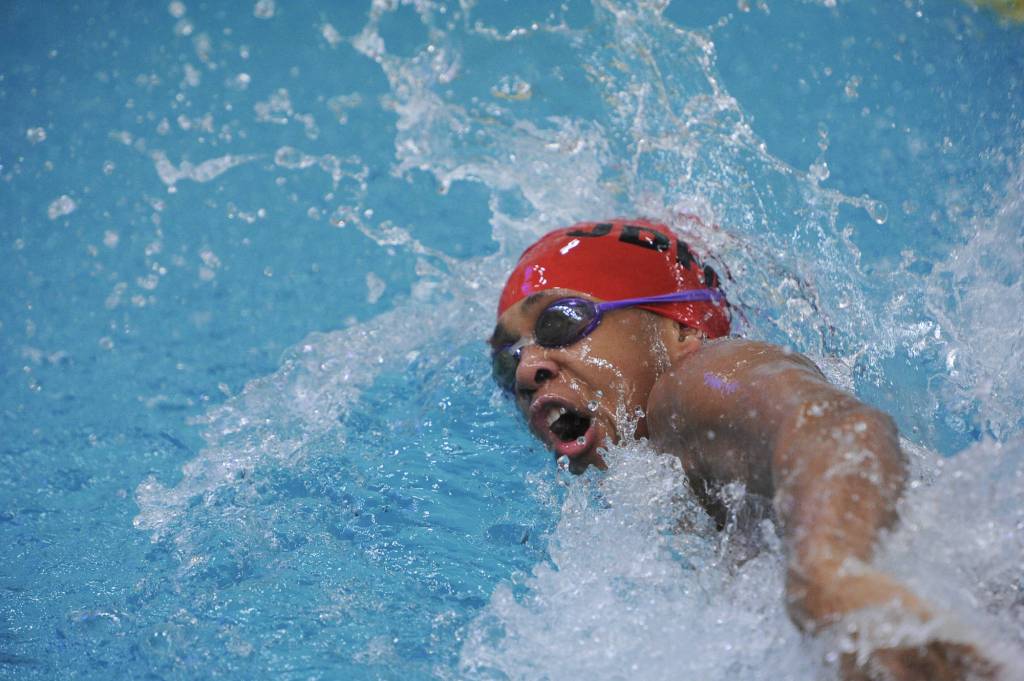 Juneau-Douglas High School freshman Adrell Mulgrew-Truitt swims in the 200-yard freestyle relay at the ASAA/First National Bank Alaska State Swim and Dive Championships on Saturday, Nov. 3, 2018. The team finished in seventh place with a time of 1:38.66. (Michael Dinneen | For the Juneau Empire)