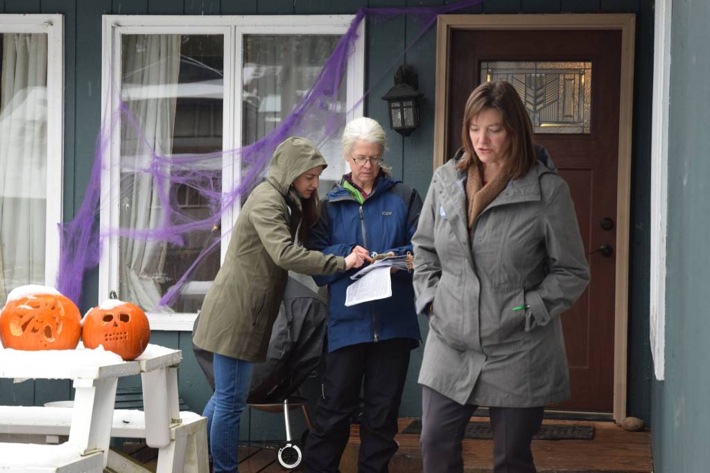 Alyse Galvin, Alaskas independent candidate for U.S. House of Representatives, leaves a home after talking with its residents Sunday, Nov. 4, 2018 in the Mendenhall Valley. Galvin was in Juneau for a final campaign stop ahead of the election. (James Brooks | Juneau Empire)