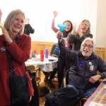 Andi Story, Democratic candidate for House District 34, celebrates her election night win with family on Tuesday. Story defeated Republican candidate Jerry Nankervis to take hold of one of three contested statehouse seats. (Michael Penn | Juneau Empire)