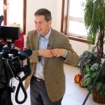 Alaska Democratic gubernatorial candidate Mark Begich prepares for an interview in Anchorage, Alaska, Sunday, Nov. 4, 2018. Begich lost to Republican Mike Dunleavy. (AP Photo/Becky Bohrer)