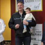 Alaska Gov.-elect Mike Dunleavy, center, speaks to supporters at his campaign headquarters on Monday. Dunleavy announced a handful of appointments Thursday, including Brett Huber, at left, as senior policy adviser. (Becky Bohrer | The Associated Press File)