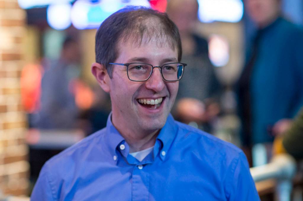 Jesse Kiehl, Democratic candidate for Senate District Q, talks with supporters at McGivenys Sports Bar and Grill on election night. Kiehl won his race over independent candidate Don Etheridge. (Michael Penn | Juneau Empire)