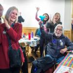 Andi Story, Democratic candidate for House District 34, celebrates her election night win with family on Tuesday. Story defeated Republican candidate Jerry Nankervis to take hold of one of three contested statehouse seats. (Michael Penn | Juneau Empire)