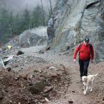 Andy Smoker hikes up Perseverance Trail with his dog, Linda, on Friday, Nov. 9, 2018. Work was completed recently to clear rock and debris along the trail. (Michael Penn | Juneau Empire)