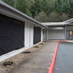 Broken windows are covered up at The Church of Jesus Christ of Latter-day Saints on Wednesday, Oct. 24, 2018, after reports of vandalism on Monday night. (Michael Penn | Juneau Empire File)