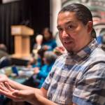 X̱ unei Lance Twitchell, Associate Professor of Alaska Native Languages Arts and Sciences at the University of Alaska Southeast, speaks about how new words are created in Native languages at the Voices of Our Ancestors Language Summit at Centennial Hall on Wednesday, Nov. 14, 2018. (Michael Penn | Juneau Empire)