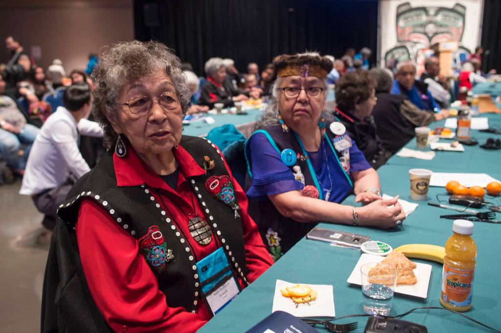 Ruth Demmert, left, and Florence Sheakley talk about how new words are created in Native languages at the Voices of Our Ancestors Language Summit at Centennial Hall on Wednesday, Nov. 14, 2018. (Michael Penn | Juneau Empire)