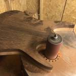 Former Juneauite Tevyn Days, who sings and plays guitar in the metal band Distance Defined, shows the body of the electric guitar he is making. (Courtesy photo | Trevyn Days)