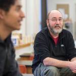 Juneau-Douglas High School Science Teacher Henry Hopkins, right, listens Friday, Nov. 16, 2018, to Senior Arias Hoyle looking to add Yadaa.at Kalé, the Tlingit name for Mount Juneau, to the high schools name. (Michael Penn | Juneau Empire)
