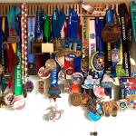 John Kerns marathon medals hang in his Juneau home. (Courtesy Photo | John Kern)