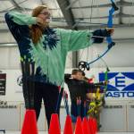 Ashley Carabajal shoots a bow during the Thanksgiving Turkey Shoot at the Alaska Department of Fish and Game Hunter Education Facility archery range on Saturday. The event was put on by the Juneau Gun Club, Juneau Shooting Sports Foundation, Juneau Archery Club and ADFG and awarded approximately 90 turkeys. (Nolin Ainsworth | Juneau Empire)