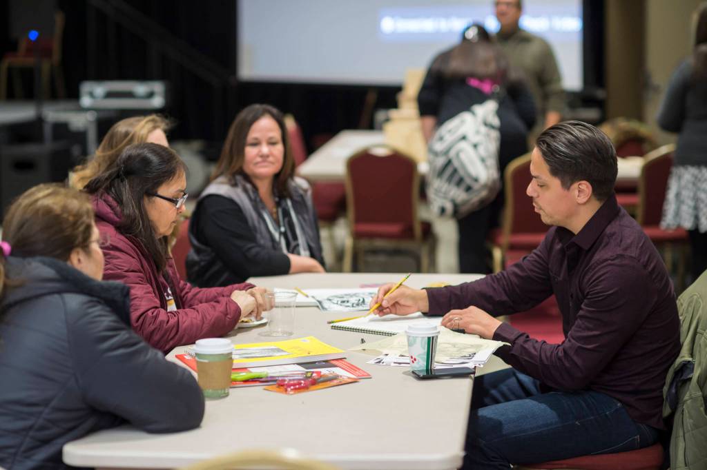 Robert Mills talks demostrates formline design at the Celebrating Our Ways of Life for Native American Heritage Month at the Elizabeth Peratrovich Hall on Friday, Nov. 16, 2018. (Michael Penn | Juneau Empire)