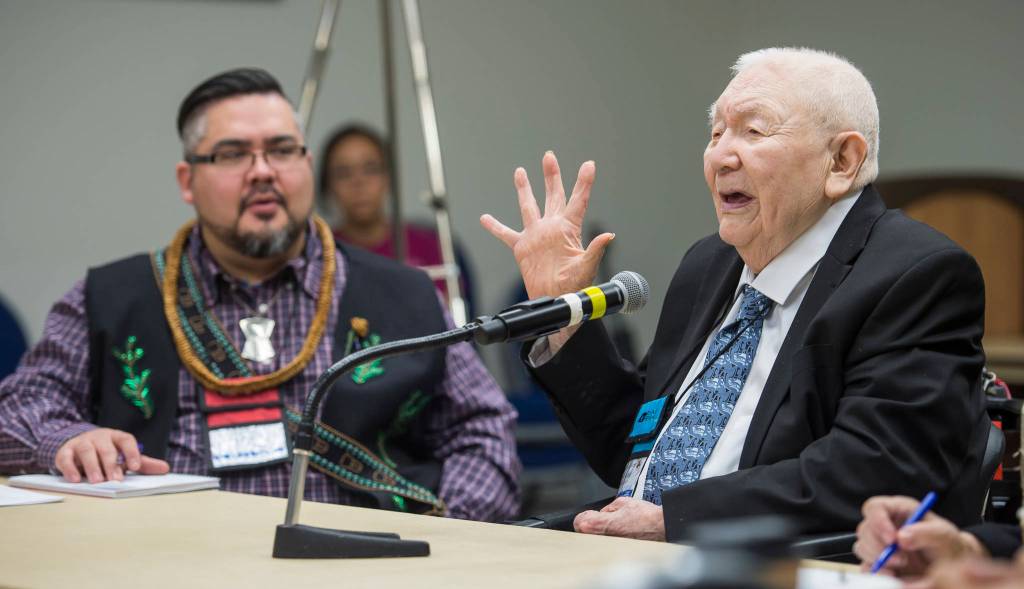 Gavin Hudson, left, listens to John Reese, of Ketchikan, speak during a breakout session on the Smalgya̱x language of the Tsimshian people at the Voices of Our Ancestors Language Summit at Centennial Hall on Wednesday, Nov. 14, 2018. (Michael Penn | Juneau Empire)