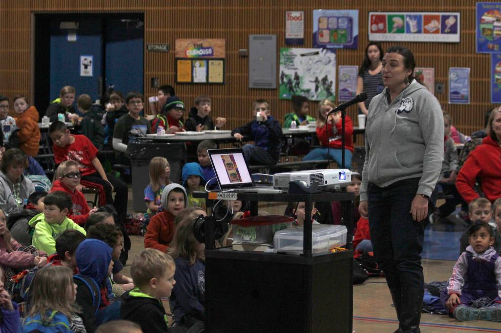 Mendenhall River Community School Principal Kristy Dillingham tells students about new playground equipment at an assembly at the school on Friday, Nov. 16, 2018. (Alex McCarthy | Juneau Empire)
