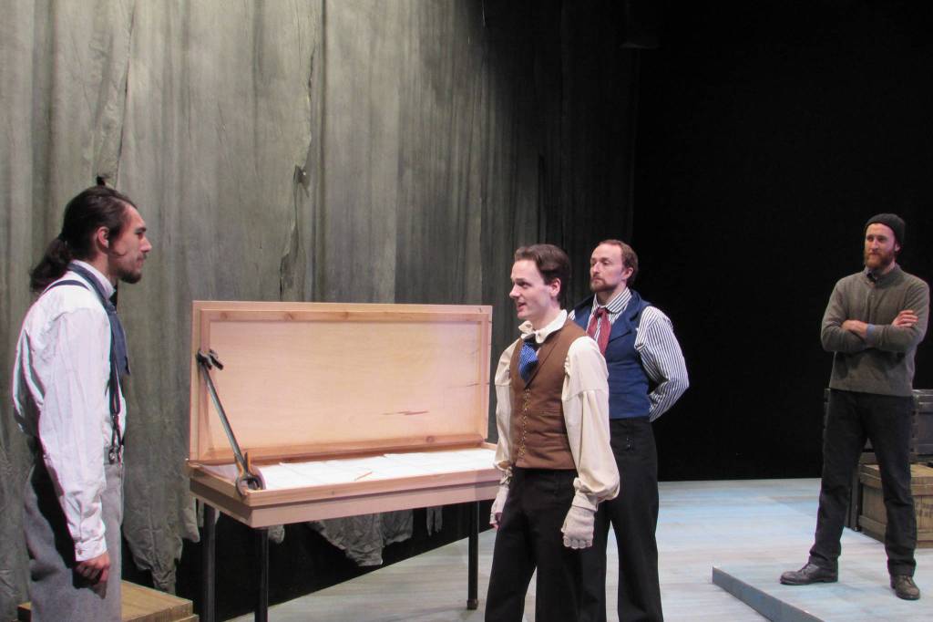 19th century explorers played by Skyler Ray-Benson Davis, Zebadiah Bodine, Connor Chaney and Travis Morris stare each other down as their expedition into the arctic faces complications during rehearsal for Franklin Sunday, Nov. 25. Franlin is Perseverance Theatres latest production and tells a story that jumps between 2014 and the 1840s. (Ben Hohenstatt | Capital City Weekly)