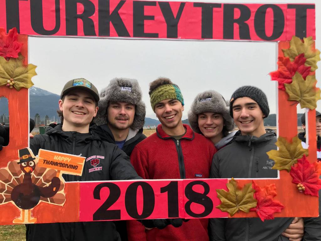 Juneau-Douglas High School hockey seniors (left to right) Cameron Smith, Bill Bosse, Ronan Lynch, Greyson Liebelt and Blake Bixby pose for a picture during the fifth annual Thanksgiving Day Turkey Trot at the Airport Dike Trail. The JDHS hockey team and Thunder Mountain High School cross country teams helped put on the event supporting their respective causes. (Courtesy Photo | Tyra Smith-MacKinnon)