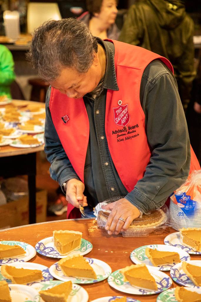 Salvation Army volunteer Alan Akiyama prepares pie at the Salvation Armys annual Thanksgiving dinner. (Courtesy Photo | Salvation Army)