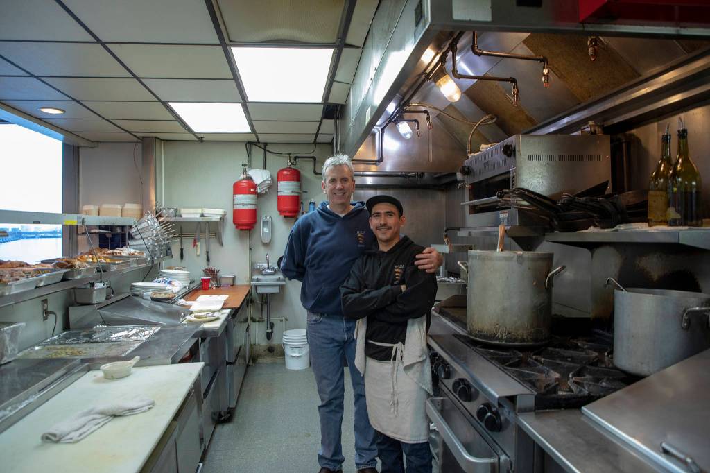 Chefs Ron Burns (left) and Juan-Antonio Salazar Ayon pose at the Salvation Armys annual Thanksgiving dinner. (Courtesy Photo | Salvation Army)