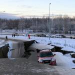 A car is trapped on a collapsed section of the offramp of Minnesota Drive in Anchorage, Friday, Nov. 30, 2018. Back-to-back earthquakes measuring 7.0 and 5.8 rocked buildings and buckled roads Friday morning in Anchorage, prompting people to run from their offices or seek shelter under office desks, while a tsunami warning had some seeking higher ground. (Dan Joling | Associated Press)
