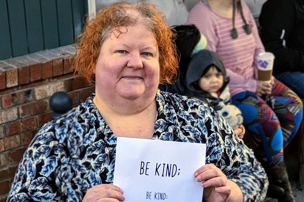 First-timers, survivors and moms get tattoos for suicide prevention