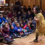 Lily Hope tells a story of raven, king salmon and the birds to second grade students from Harborview Elementary, Montessori Borealis and Juneau Charter Community School at the Walter Soboleff Center on Friday Nov. 30, 2018. The Storytelling Excursion for all Juneau School District second graders is part of the Any Given Child programming sponsored by the Juneau School District, Mayors office, University of Alaska Southeast, Sealaska Heritage Institute and the Juneau Arts and Humanities Council. The Storytelling Excursion is funded by Sealaska Heritage Institute, Behrends Mechanical, Inc., Juneau School District and the Juneau Arts & Humanities Council. (Michael Penn | Juneau Empire)