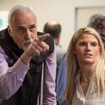 House District 1 candidate Republican Bart LeBon points to a vote tally board with his campaign manager Brittany Hartmann during a election recount at the Department of Elections Juneau office on Friday, Nov. 30, 2018. Republican Bart LeBon picked up two votes while Democrat Kathryn Dodge picked up one making him the winner of the election with a total of 2,663 votes. (Michael Penn | Juneau Empire)