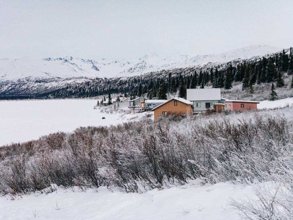 Fielding Lake cabins along the coast of the frozen lake. (Gabe Donohoe | For the Juneau Empire)