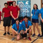 Team Juneau poses with its medals after competing in the Yukon Inter-Schools Arctic Sports Championships at the Porter Creek Secondary School in Whitehorse, Yukon, on Friday, Nov. 30, 2018. Top row (Left to right): Coach Kaytlynne Lewis, Erik Jim, Josh Sheakley, Sara Steeves, coach Kyle Worl. Bottom row: Orion Denny, Matthew Quinto. (Courtesy Photo | Kyle Worl)