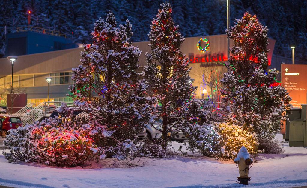 Christmas lights decorate the entrance to Bartlett Regional Hospital on Friday, Dec. 21, 2018. (Michael Penn | Juneau Empire)