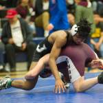 Thunder Mountains Jahrease Mays wrestles Ketchikans Matthew Rodriguez during their 125-pound finals match in the Region V Division I Wrestling Championships at TMHS on Saturday, Dec. 8, 2018. Rodriguez earned a 3-2 decision to win the region title. (Nolin Ainsworth | Juneau Empire)