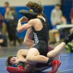 Thunder Mountains Kadin Messmer wrestles Ketchikans Degan Linne during their 103-pound finals match in the Region V Division I Wrestling Championships at TMHS on Saturday, Dec. 8, 2018. Linne pinned Messmer at 5:44 to win the region title. (Nolin Ainsworth | Juneau Empire)