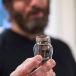 Reber Stein talks Wednesday, Dec. 5, 2018, about making tube amplifiers for his friends. Stein has been tinkering with the guitar amplifiers that make use of vacuum tubes for about a decade. (Michael Penn | Juneau Empire)