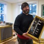 Reber Stein talks Wednesday, Dec. 5, 2018, about making tube amplifiers for his friends. Stein has been tinkering with the guitar amplifiers that make use of vacuum tubes for about a decade. (Michael Penn | Juneau Empire)