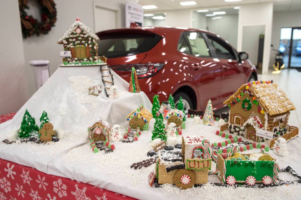 A gingerbread house entered by Northrim Bank sits on display at Mendenhall Auto on Wednesday, Dec. 12, 2018. The displays are a fundraiser for the Southeast Alaska Foodbank. (Michael Penn | Juneau Empire)