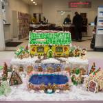 A gingerbread house entered by Pavitts Health & Fitness sits on display at Mendenhall Auto on Wednesday, Dec. 12, 2018. The displays are a fundraiser for the Southeast Alaska Foodbank. (Michael Penn | Juneau Empire)