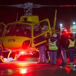 Juneauites board a Coastal Helicopter for the annual Christmas Lights Flights at the Juneau International Airport on Friday, Dec. 15, 2017. Mendenhall Flying Lions put on the event, which is a fundraiser for the American Childrens Tumor Foundation. Petro Marine Services and Coastal Fuel also support the event. (Michael Penn | Juneau Empire File)
